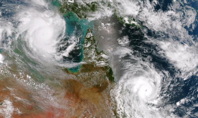 Cyclones Lam and Marcia Head Onshore