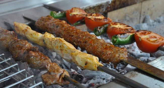 Kebabs cooking on the grill from Shiraz Palace in Liverpool