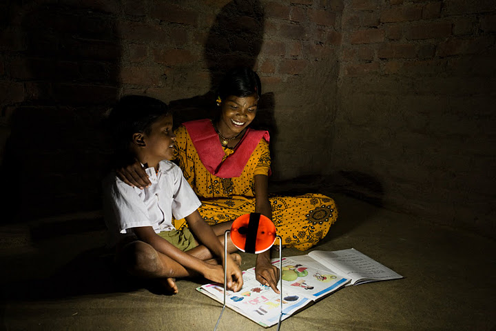 Children studying with Sun King