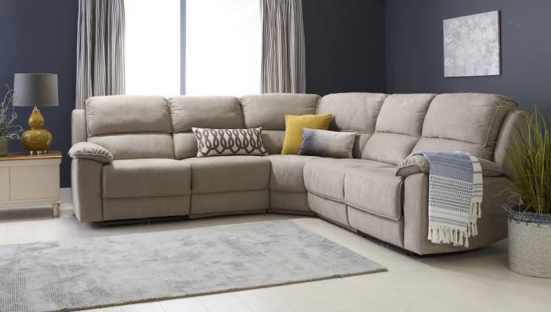 Beige corner recliner sofa in blue living room