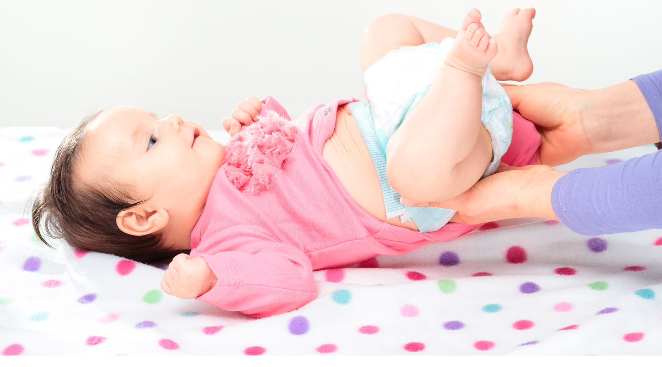 Q&A: Baby squirmy on diaper table?