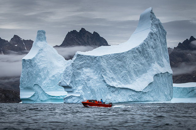 Small boat and big iceberg near Tasiilaq