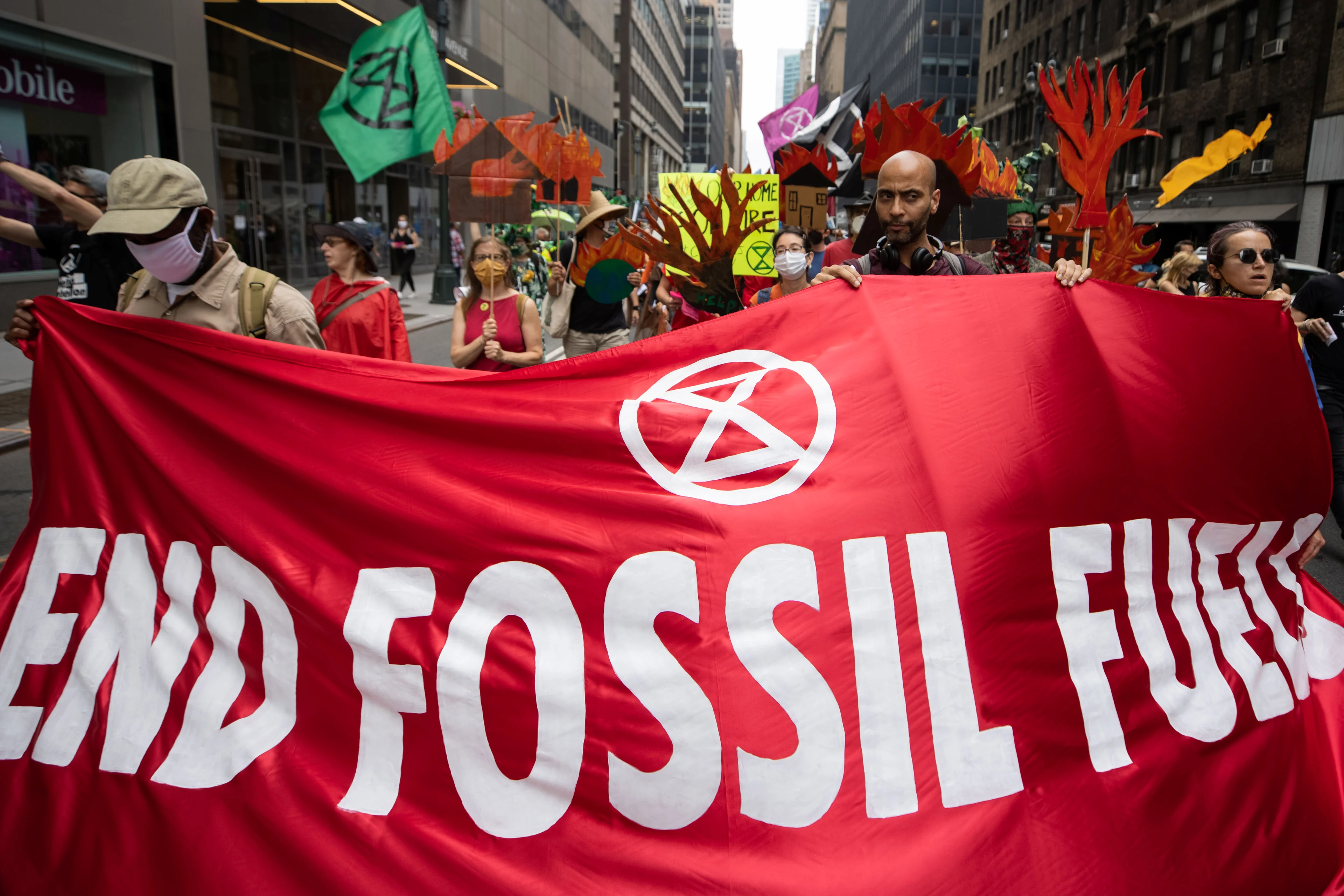Reuters: FILE PHOTO: People protest during a 'non-violent resistance' climate change protest organized by Extinction Rebellion in the Manhattan borough of New York City, U.S., September 17, 2021. REUTERS/Caitlin Ochs