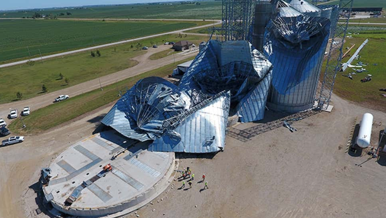 High winds from the August 10, 2020 derecho crushed these grain bins in Tama County, Iowa. Courtesy Kip Ladage via NWS-Des Moines, Iowa