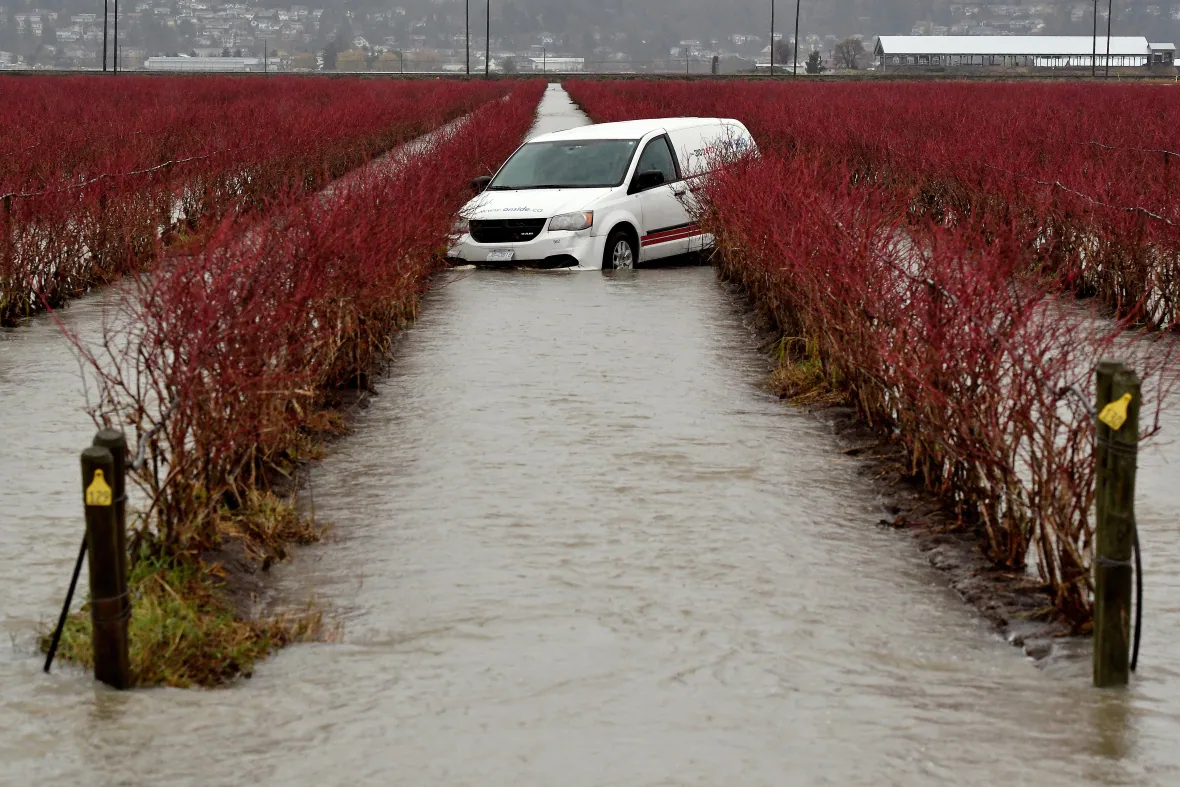 flooded-car-in-field-abbotsford