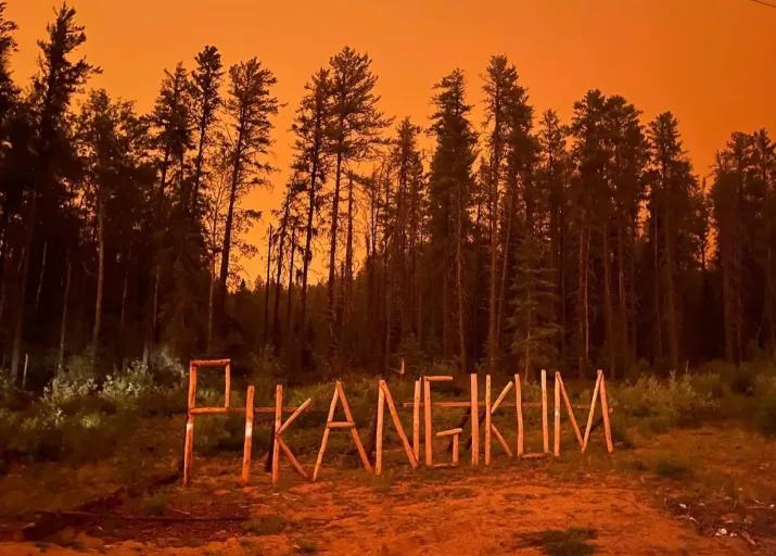 (CBC) Orange skies over Pikangikum First Nation, Ontario (Submitted by Amanda Sainnawap)
