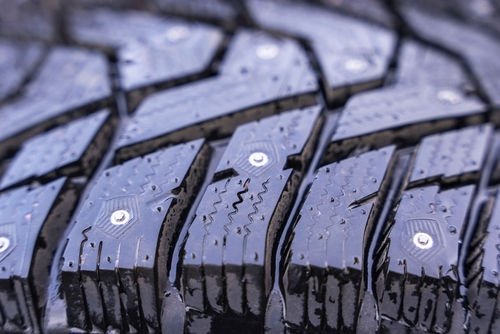 Close-up of winter tire tread with sipes
