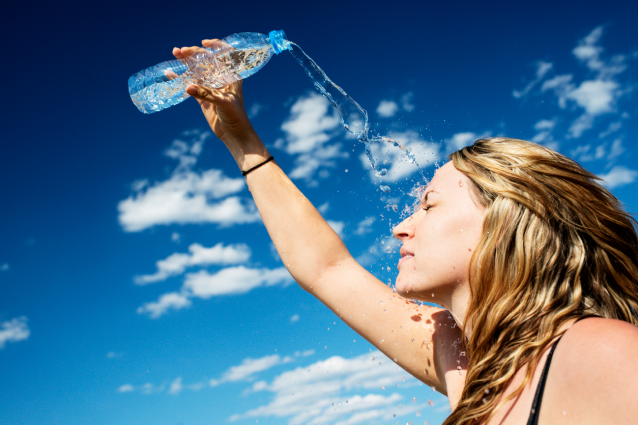 Cool down your skin with cold water to treat headache and fever caused by heatstroke