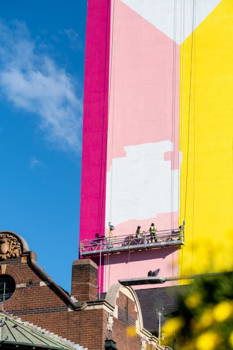 Blooms, blue skies, bricks and a mural that will make you smile. Photo: Chris Southwood / City of Sydney