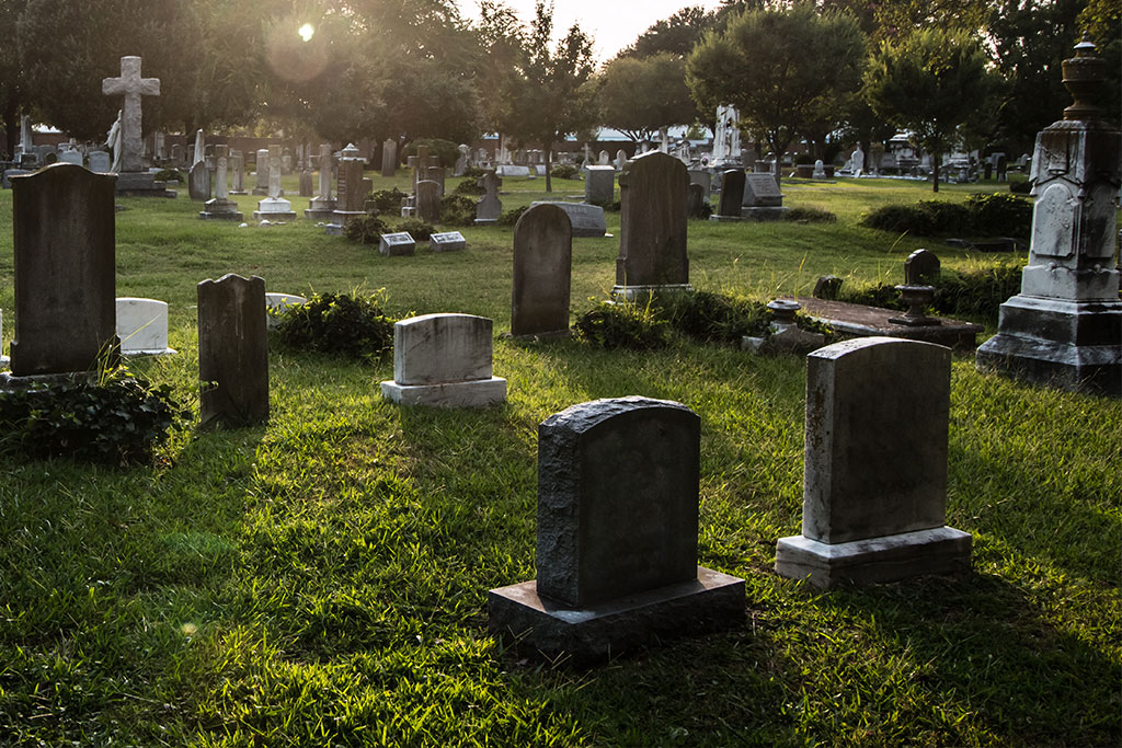 tombstones-in-cemetery-at-dusk