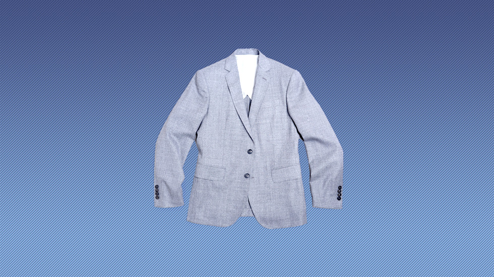 Flat shot of a light gray Brooklyn Tailors jacket on a blue striped backdrop.
