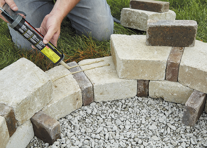 DIY firepit8:Make sure to use an all-weather formula landscape adhesive.