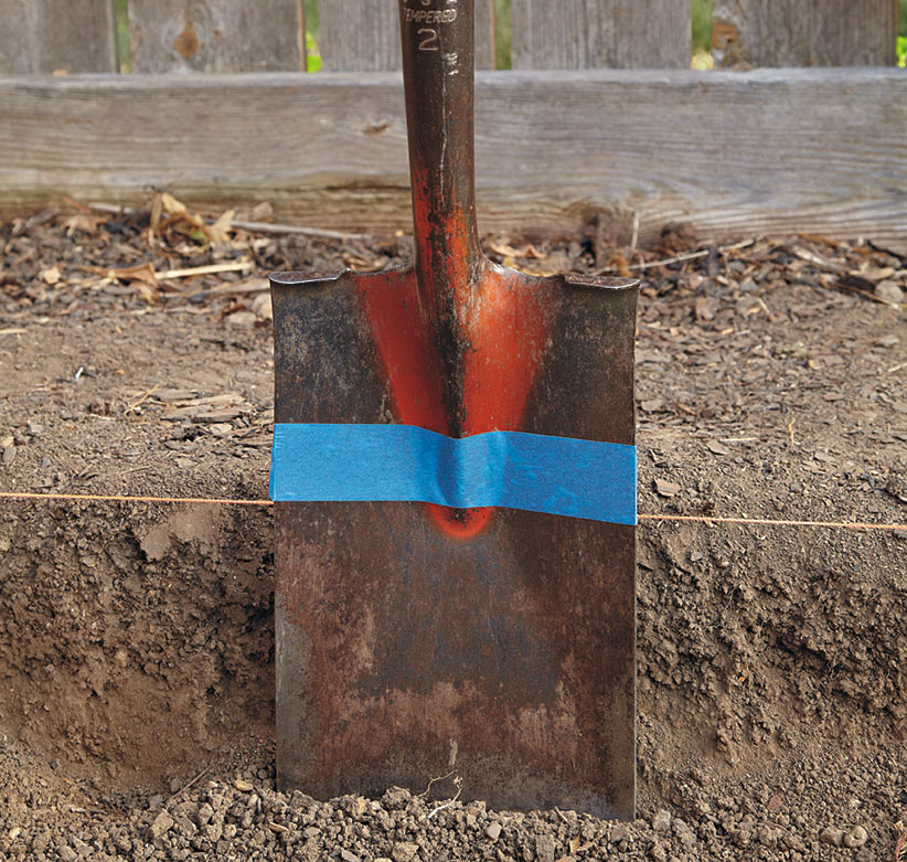 Place a piece of tape on the shovel so you know how deep to dig.: Place a piece of tape on the shovel so you know how deep to dig.