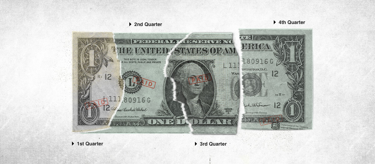 American dollar bill torn into four pieces