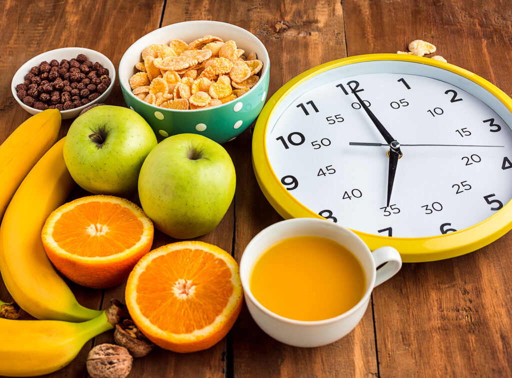 fruits cereal and clock
